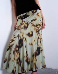 Model wearing Cut about midi skirt in green blur floral