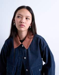Model wearing Cut cord jacket with contrast cord collar in navy