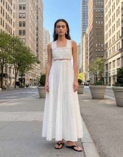 Model wearing Cutwork broderie mixed trapeze maxi dress in white