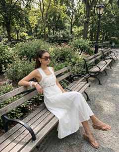Model wearing Cutwork broderie mixed trapeze maxi dress in white