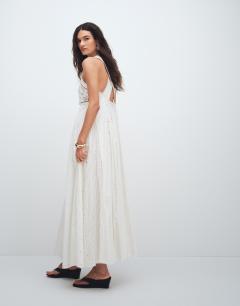 Model wearing Cutwork broderie mixed trapeze maxi dress in white