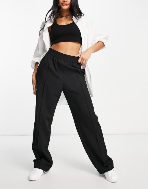 Topshop – Czarne dopasowane joggersy z zaszewkami 
