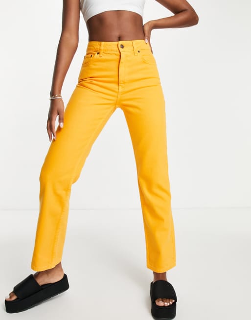 Topshop store yellow jeans