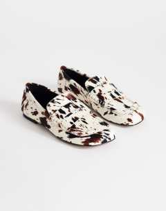 Model wearing Daniel flat square toe loafer in animal print hair on real leather