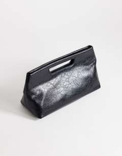 Model wearing Daniel medium rectangle grab bag in black