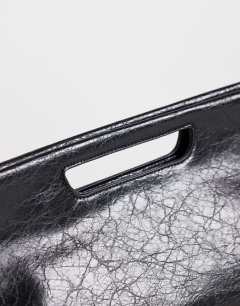 Model wearing Daniel medium rectangle grab bag in black
