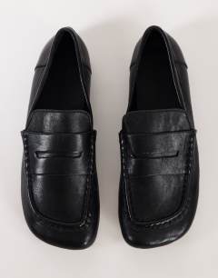 Model wearing Daniel real leather flat square toe loafer in black