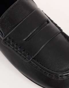 Model wearing Daniel real leather flat square toe loafer in black