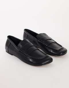 Model wearing Daniel real leather flat square toe loafer in black