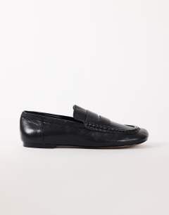 Model wearing Daniel real leather flat square toe loafer in black