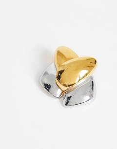 Model wearing Danny waterproof stainless steel statement earrings in gold and silver