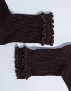 Model wearing Daphne double frill sock in chocolate
