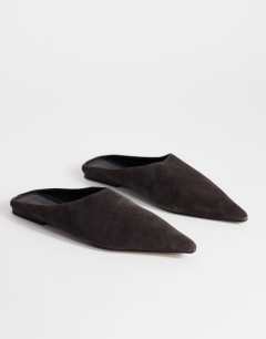 Model wearing Dawn real suede flat pointed shoe in chocolate