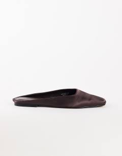 Model wearing Dawson slip on mule in chocolate satin