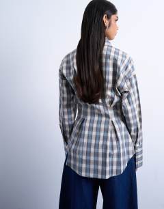 Model wearing Deep cuff shirt in check print