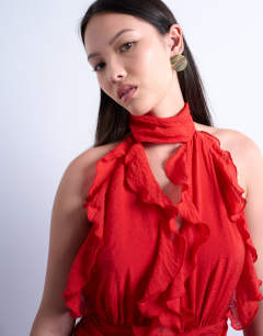 Model wearing Deep plunge ruffle maxi gown in red