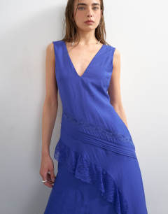 Model wearing Deep v lace insert maxi dress in cobalt