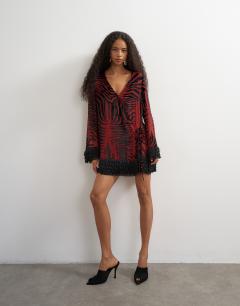 Deep v mini wrap mini dress in red devore zebra with embellished fringed hem