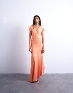 Model wearing Deep v tucked side satin maxi dress in peach