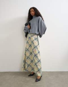 Model wearing Deep waistband full circle maxi skirt in check print