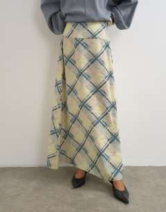 Model wearing Deep waistband full circle maxi skirt in check print