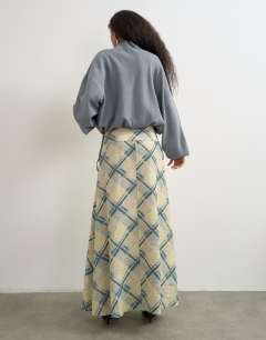 Model wearing Deep waistband full circle maxi skirt in check print