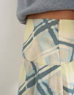 Model wearing Deep waistband full circle maxi skirt in check print