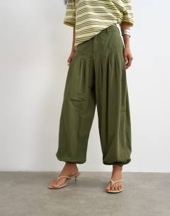 Model wearing Deep yoke balloon trouser in khaki