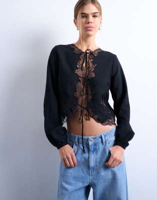 ir・Delicate Lace Tie-Front Blouse Delicate tie front long sleeve top with lace in black | Topshop