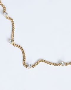 Model wearing Demi chain necklace with diamantes in stainless gold