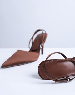 Model wearing Demi cone heel court shoe with tie in chocolate