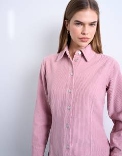 Model wearing Denim 70s collar shirt in pink cord