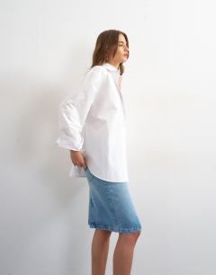 Model wearing Denim 90s midi skirt in bleach