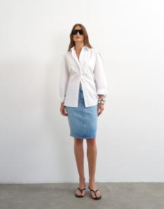 Model wearing Denim 90s midi skirt in bleach