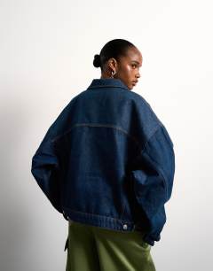Model wearing Denim balloon jacket in indigo rinse