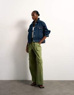 Model wearing Denim balloon jacket in indigo rinse