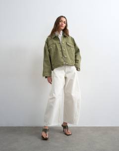 Model wearing Denim balloon jacket in olive green