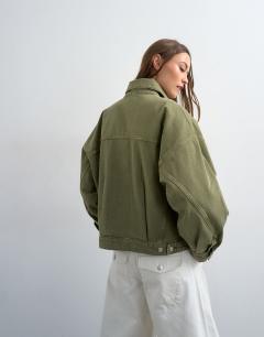 Model wearing Denim balloon jacket in olive green