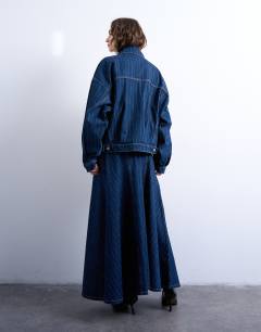 Model wearing Denim balloon sleeve jacket in indigo stripe