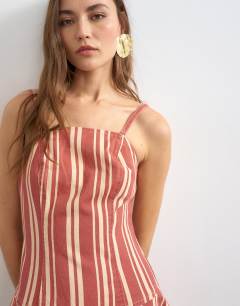 Model wearing Denim barrel maxi dress in red stripe