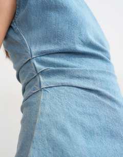 Model wearing Denim boat neck ruched side top in mid blue