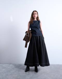 Model wearing Denim boat neck top in indigo rinse