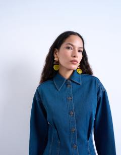 Model wearing Denim cinch detail mini dress in blue black