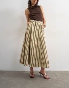 Model wearing Denim circle seamed maxi skirt in stripe