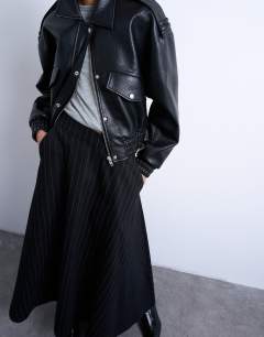 Model wearing Denim circle skirt in black stripe