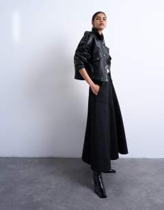 Model wearing Denim circle skirt in black stripe