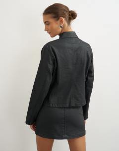 Model wearing Denim coated fitted jacket in black