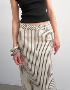 Model wearing Denim column maxi skirt in black and ecru stripe