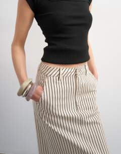 Model wearing Denim column maxi skirt in black and ecru stripe