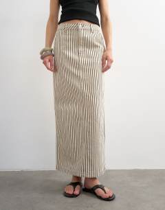 Model wearing Denim column maxi skirt in black and ecru stripe